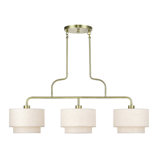 Manorwood 3-Light Extra Large Linear Chandelier with Oatmeal Shades in Antique Brass