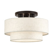 Manorwood 3-Light 15" Semi-Flush Mount with Oatmeal Shade in English Bronze