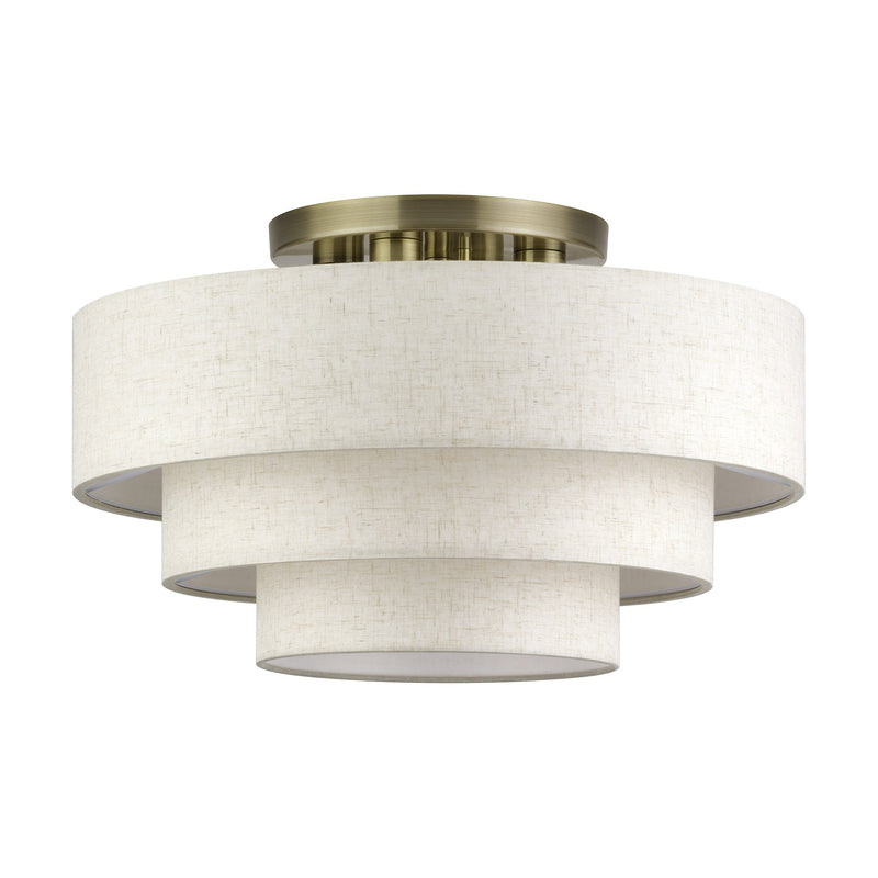 Manorwood 4-Light 21" Semi-Flush Mount with Oatmeal Shade in Antique Brass