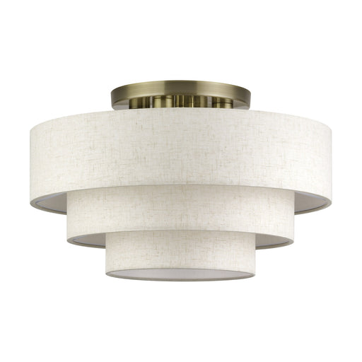 Manorwood 4-Light 21" Semi-Flush Mount with Oatmeal Shade in Antique Brass