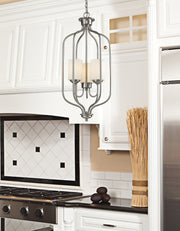 Cardinal 3 Light 13.5" Chandelier in Brushed Nickel in a room setting