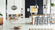 Moundou 5 Light 20" Pendant in Bronze in a room setting