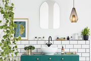 Quintus 1 Light 9.25" Pendant in Rubbed Brass in a room setting