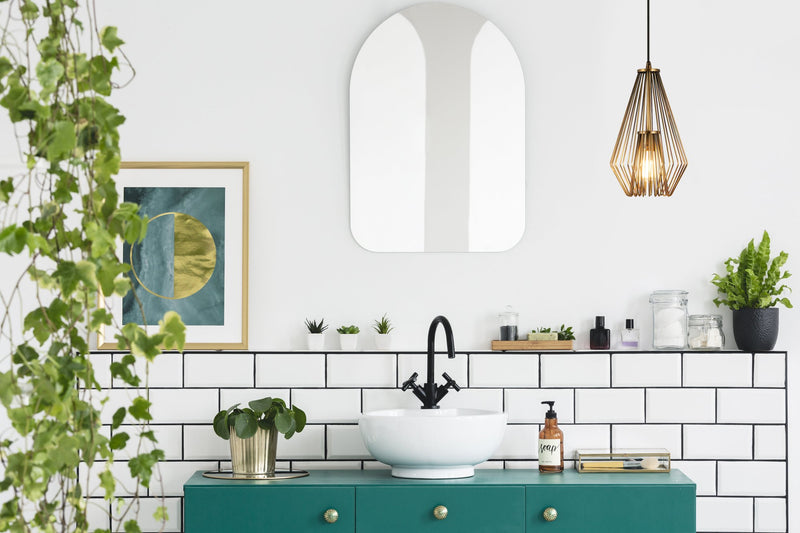 Quintus 1 Light 9.25" Pendant in Rubbed Brass in a room setting