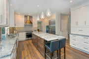 Quintus 1 Light 9.25" Pendant in Gloss White in a room setting