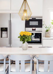 Quintus 1 Light 12.25" Pendant in Metallic Gold in a room setting