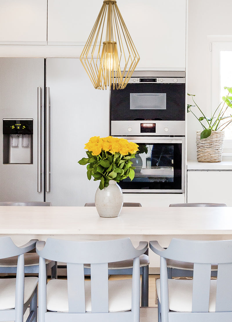 Quintus 1 Light 12.25" Pendant in Metallic Gold in a room setting