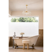 Maria Theresa 5 Light 20" Chandelier in Gold in a room setting