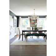 Maria Theresa 12 Light 29" Chandelier in Gold in a room setting