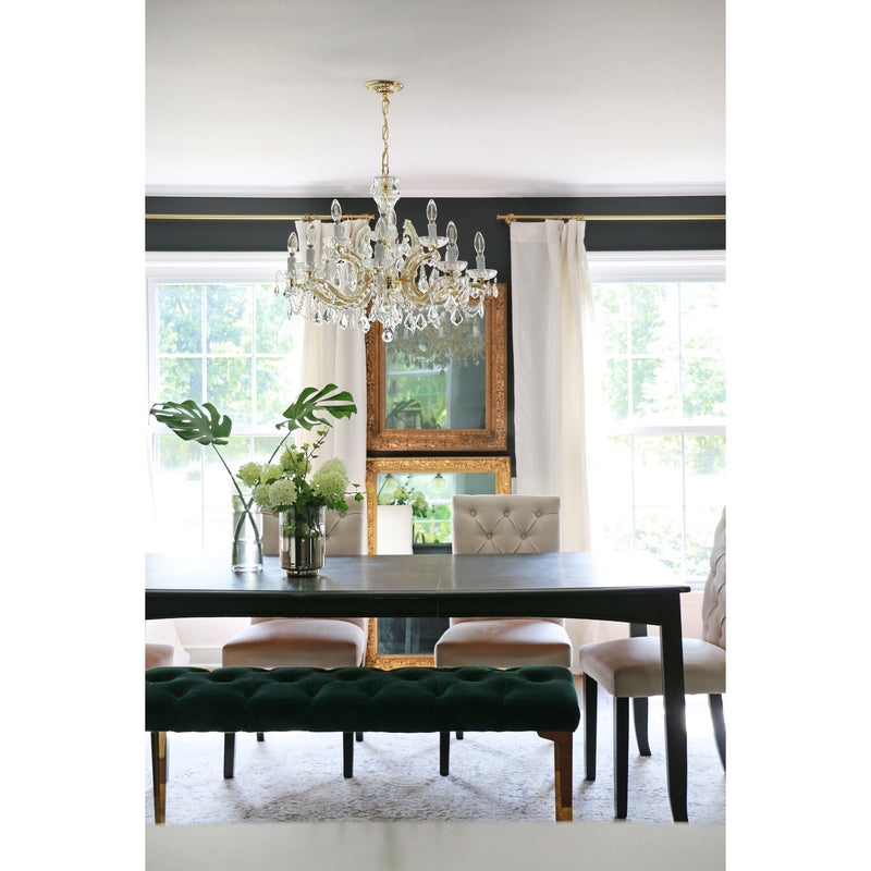 Maria Theresa 12 Light 29" Chandelier in Gold in a room setting