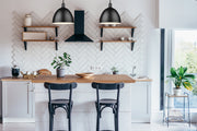 Sawyer 1 Light 12.5" Pendant in Matte Black in a room setting