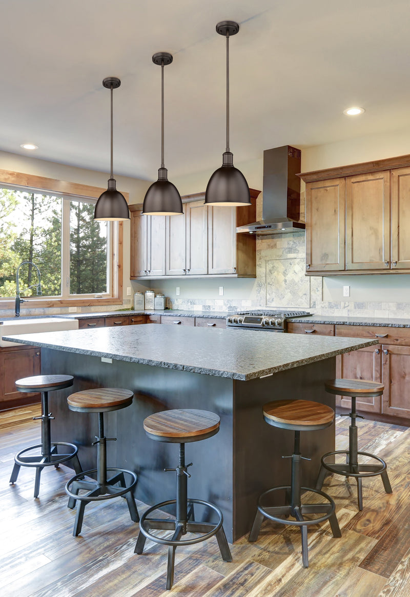 Sawyer 1 Light 8.25" Pendant in Bronze in a room setting