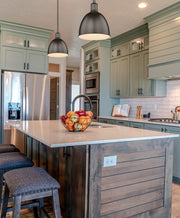Sawyer 1 Light 8.25" Pendant in Bronze in a room setting