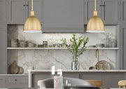 Sawyer 1 Light 8.25" Pendant in Classic Brass in a room setting