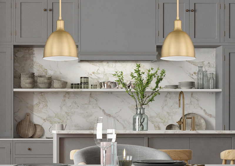 Sawyer 1 Light 8.25" Pendant in Classic Brass in a room setting