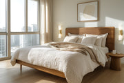 Emrys 2 Light 4.5" Wall Sconce in Modern Gold in a room setting