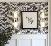 Emrys 2 Light 4.5" Wall Sconce in Polished Nickel in a room setting