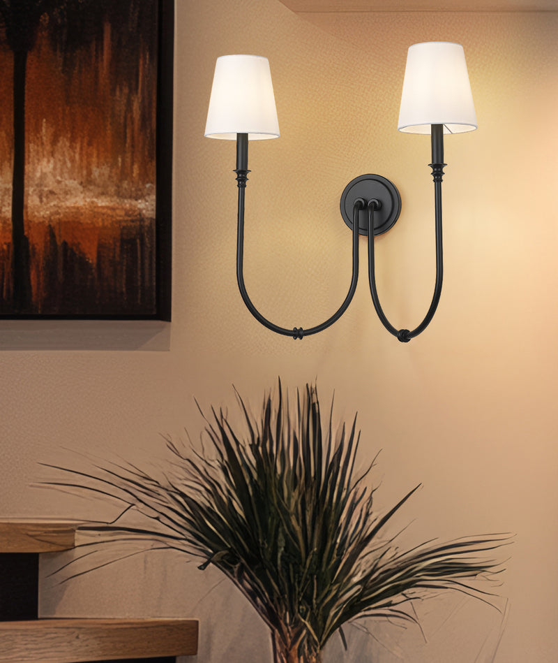 Jisele 2 Light 20" Wall Sconce in Matte Black in a room setting