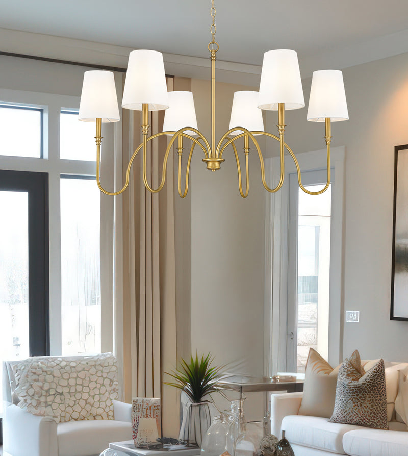 Jisele 6 Light 41.75" Chandelier in Rubbed Brass in a room setting