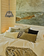 Iuka 3 Light 16" Chandelier in Bronze in a room setting