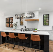 Titania 10 Light 54" Linear Pendant in Matte Black in a room setting
