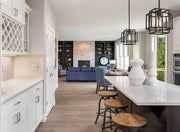 Titania 1 Light 8.5" Pendant in Matte Black in a room setting