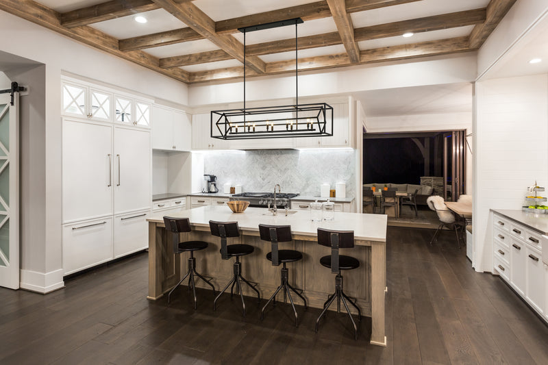 Euclid 10 Light 56" Linear Pendant in Matte Black in a room setting