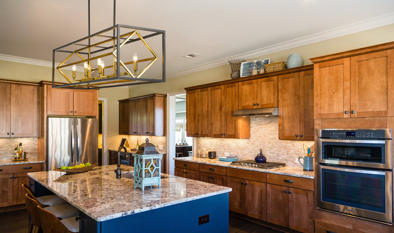 Euclid 8 Light 44" Linear Pendant in Olde Brass + Bronze in a room setting