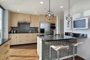Euclid 1 Light 12" Pendant in Chrome + Matte Black in a room setting
