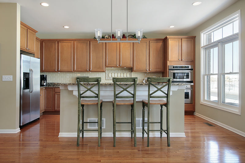Bohin 3 Light 30" Linear Pendant in Brushed Nickel in a room setting