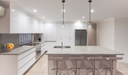 Kraken 1 Light 5.25" Pendant in Matte Black + Brushed Nickel in a room setting