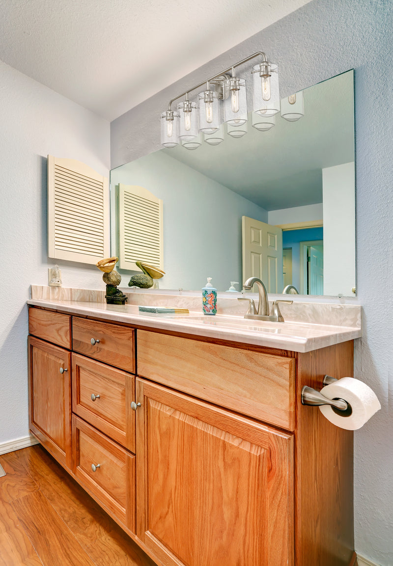 Delaney 5 Light 38" Vanity in Brushed Nickel in a room setting