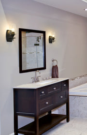 Joliet 1 Light 5" Wall Sconce in Matte Black in a room setting