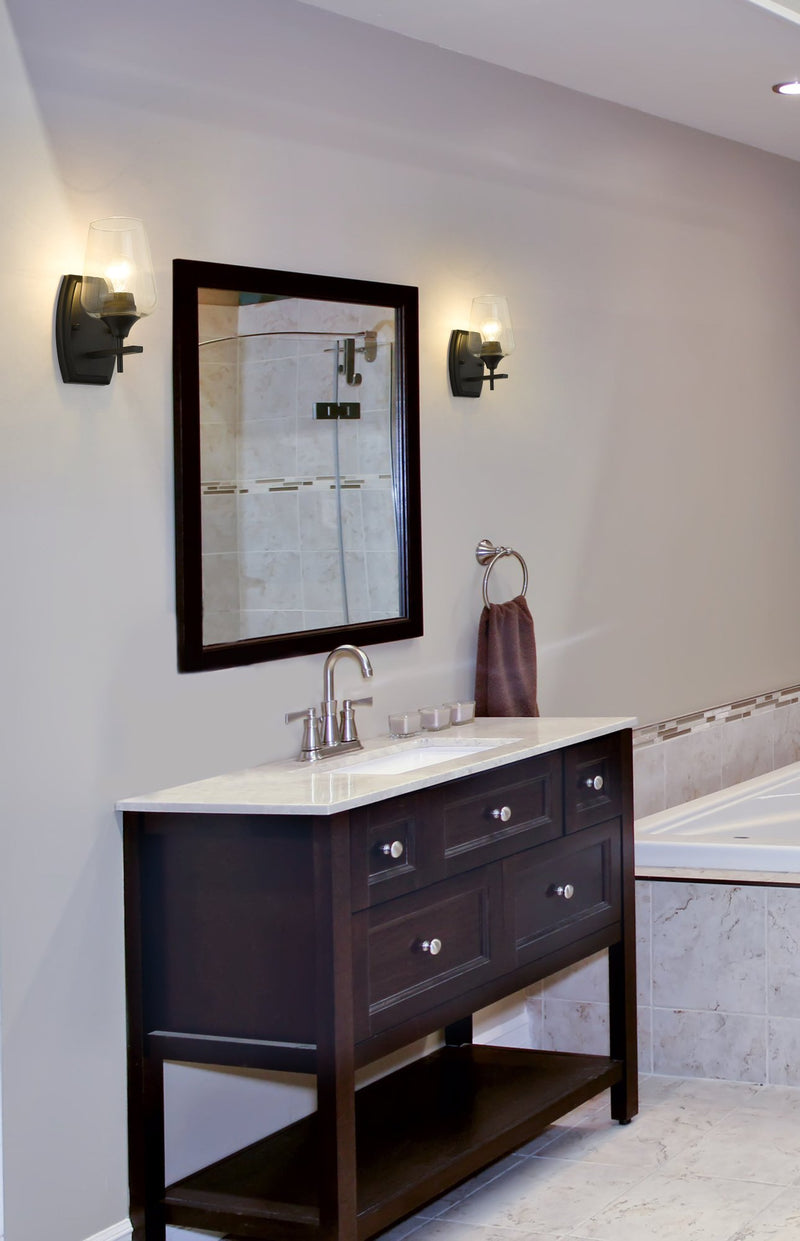 Joliet 1 Light 5" Wall Sconce in Matte Black in a room setting
