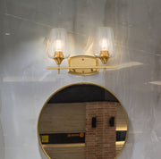 Joliet 2 Light 15" Vanity in Burnished Brass in a room setting