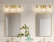 Joliet 3 Light Vanity in Burnished Brass in a room setting