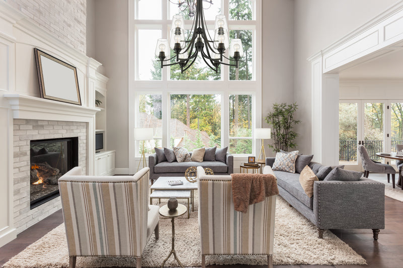 Joliet 9 Light 31" Chandelier in Matte Black in a room setting