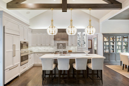 Joliet 3 Light 15.75" Pendant in Burnished Brass in a room setting