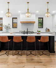 Joliet 3 Light 15.75" Pendant in Olde Brass in a room setting