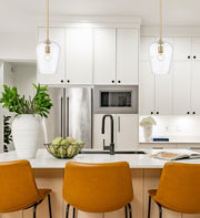 Joliet 1 Light 9" Pendant in Burnished Brass in a room setting