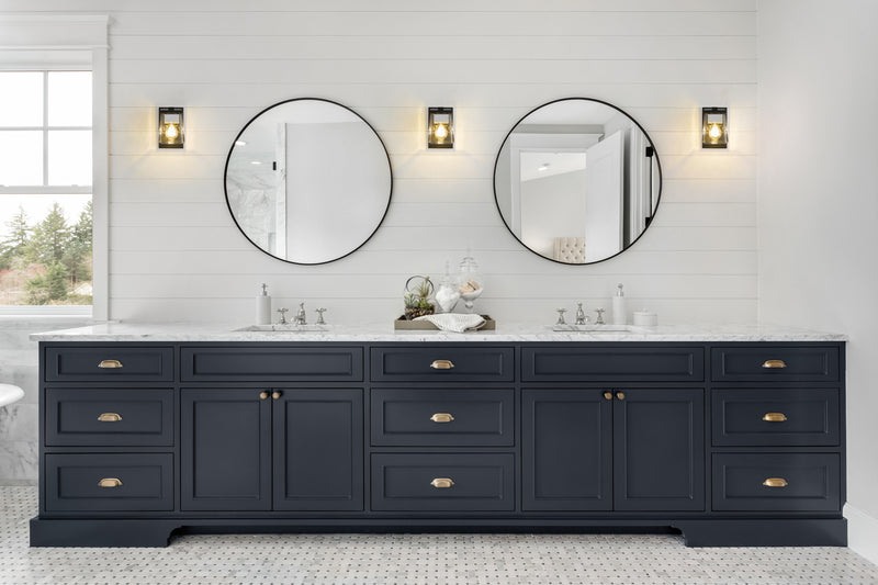 Bleeker Street 1 Light 5" Wall Sconce in Matte Black + Chrome in a room setting