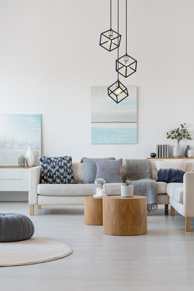 Vertical 3 Light 18" Pendant in Matte Black + Brushed Nickel in a room setting
