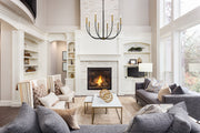 Haylie 8 Light 32.5" Chandelier in Matte Black + Olde Brass in a room setting