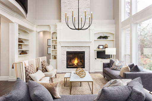 Haylie 8 Light 32.5" Chandelier in Matte Black + Olde Brass in a room setting