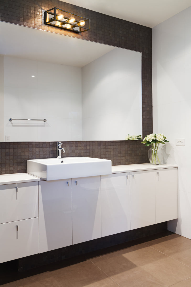Kube 3 Light 23.5" Vanity in Matte Black + Brushed Nickel in a room setting