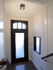 Kube 1 Light 5.75" Flush Mount in Matte Black + Chrome in a room setting