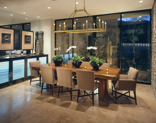 Barclay 12 Light 45" Linear Pendant in Olde Brass in a room setting