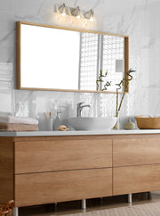 Harper 3 Light 23" Vanity in Brushed Nickel in a room setting