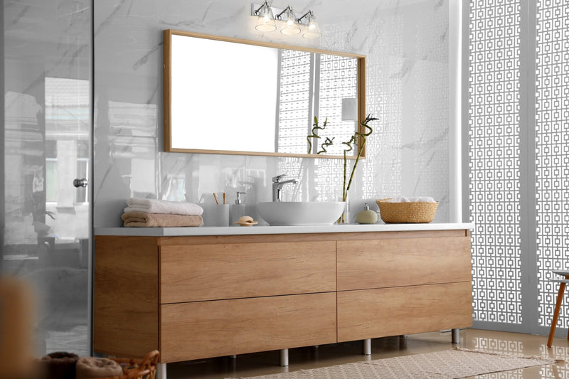 Harper 3 Light 23" Vanity in Chrome in a room setting