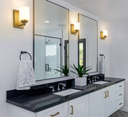 Soledad 1 Light 4.5" Wall Sconce in Brushed Gold in a room setting
